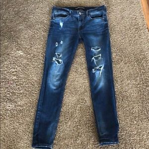 Distressed express mid rise leggings/jeans